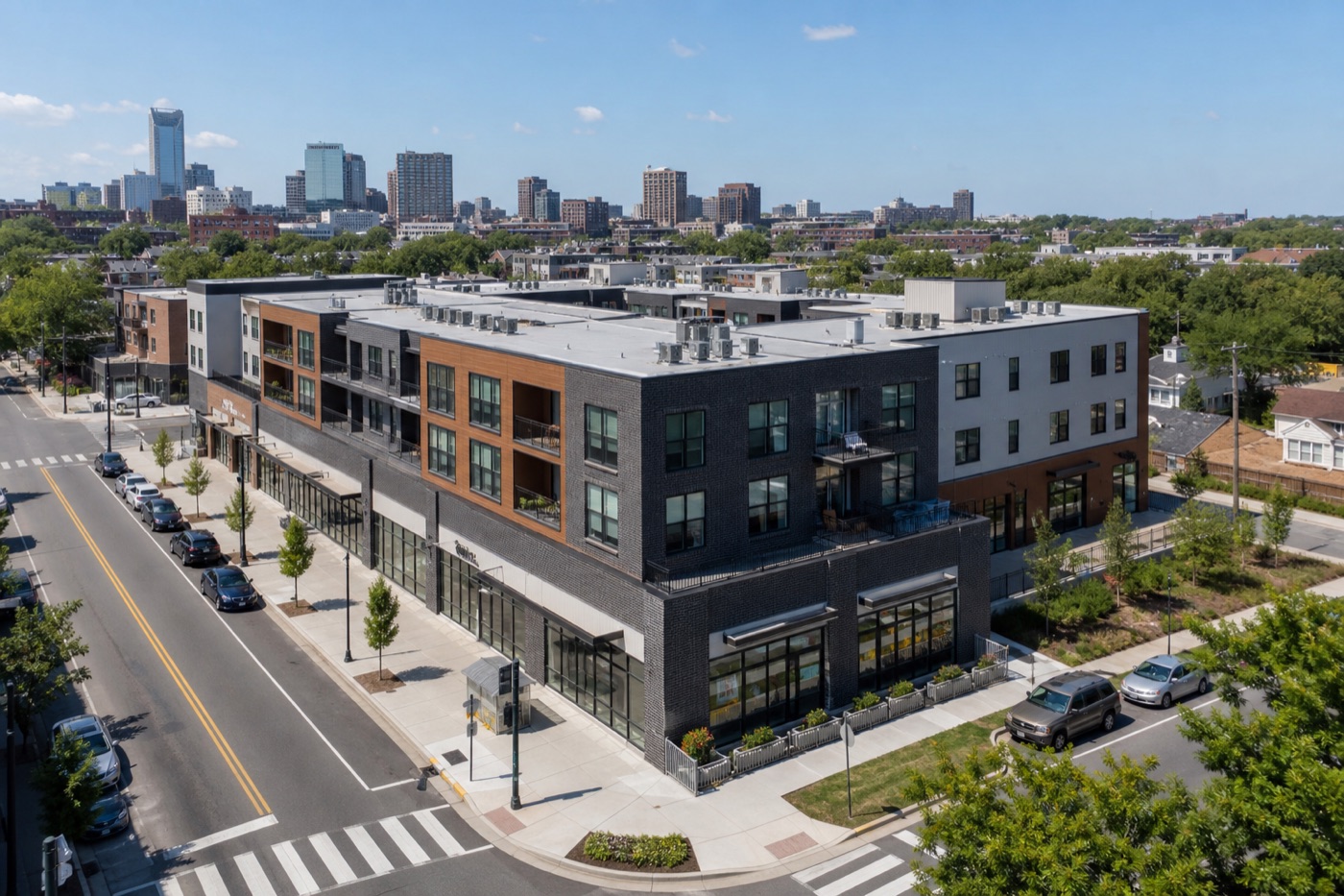 Mixed-use commercial property with ground-floor retail and upper residential units in an urban neighborhood
